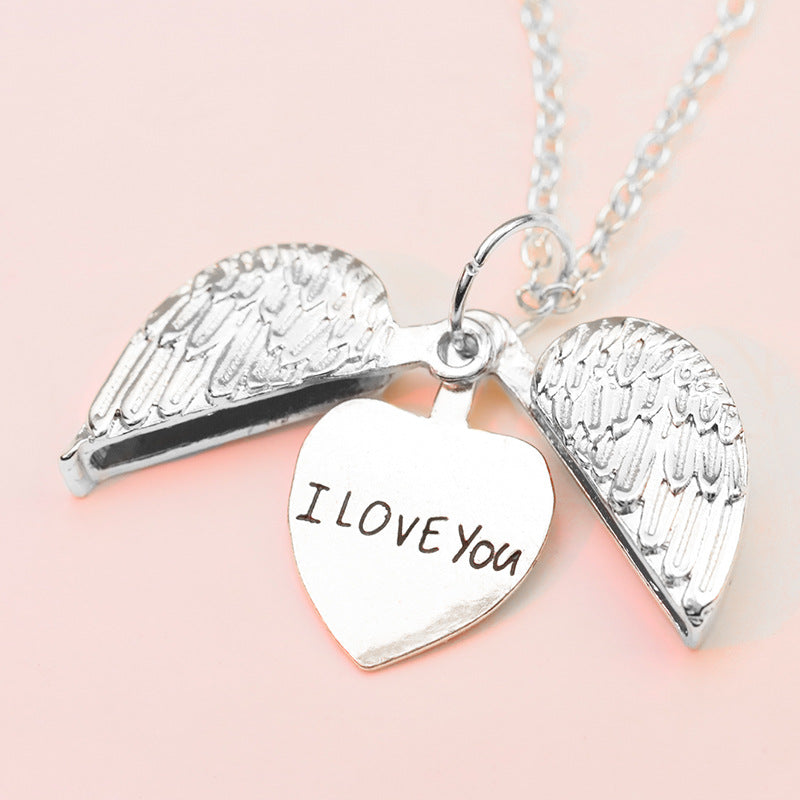 Open Your Heart Angel Wings Love Necklace in Silver or Gold.