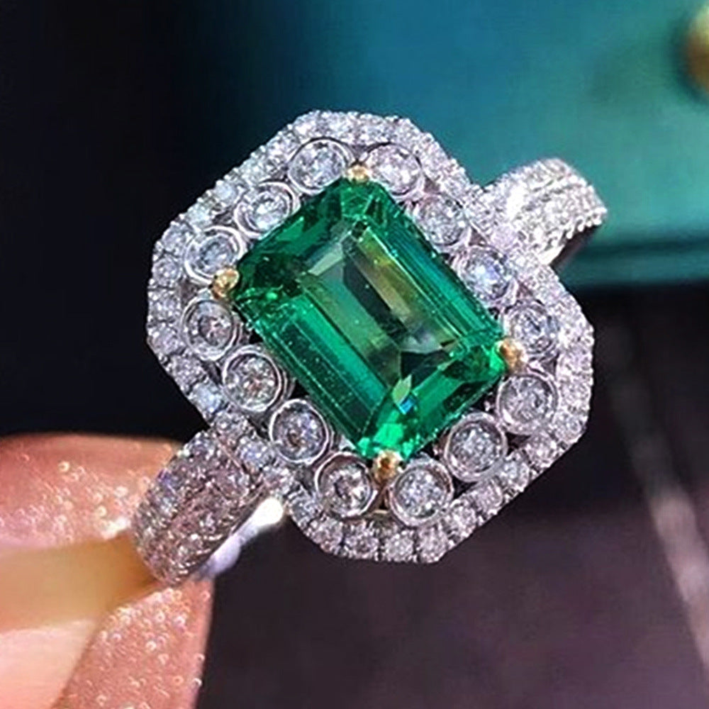 Sparkling Emerald Cocktail Ring Surrounded by Gemstones.