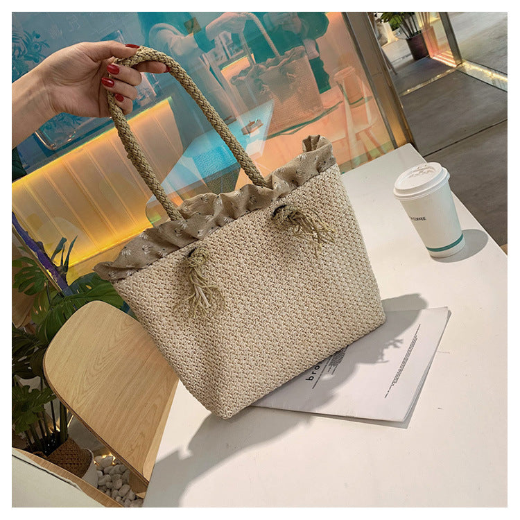 Eco-Friendly Woven Straw Bucket Style Tote Bag with Braided Handler.