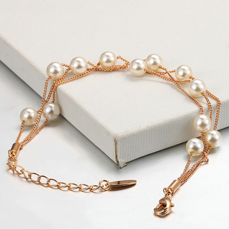 Unique Blend of Classic & Modern Three Layer Faux Pearl Bracelet.