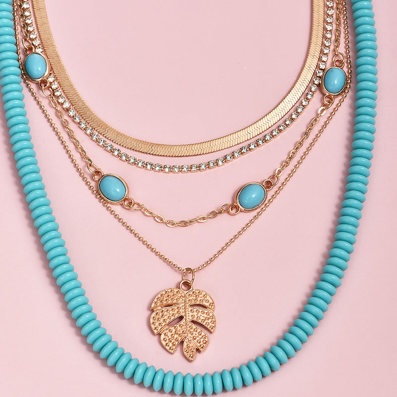 Boho Turquoise & Gold Leaf Multilayer Women's 5 Necklace Set.