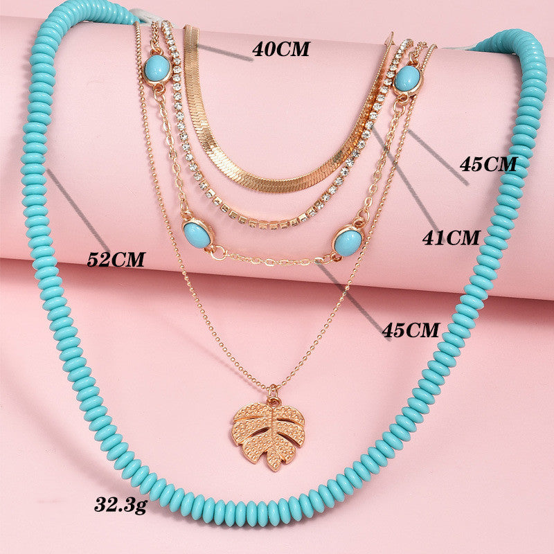 Boho Turquoise & Gold Leaf Multilayer Women's 5 Necklace Set.