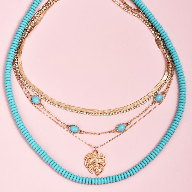 Boho Turquoise & Gold Leaf Multilayer Women's 5 Necklace Set.