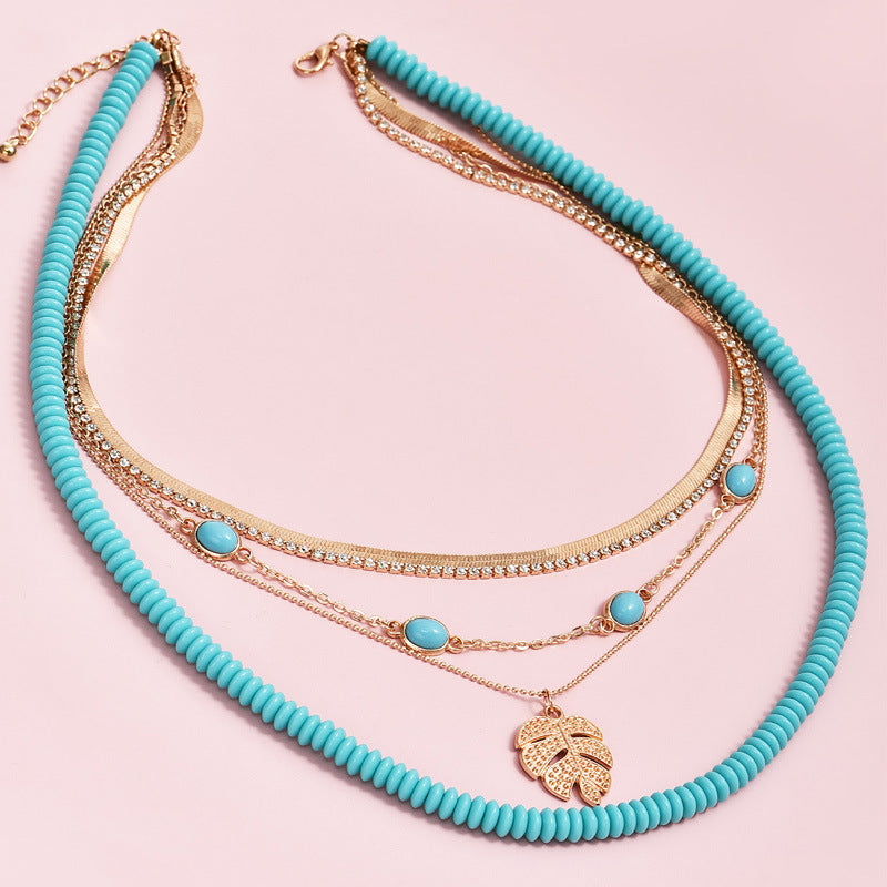 Boho Turquoise & Gold Leaf Multilayer Women's 5 Necklace Set.