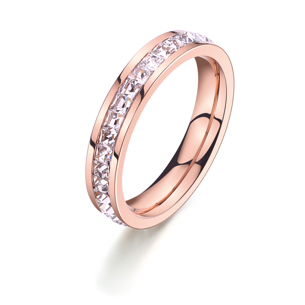 Simple and Elegant Titanium Steel Gold-plated 18K Rose Gold Ring with Sparkling CZ Inlay.
