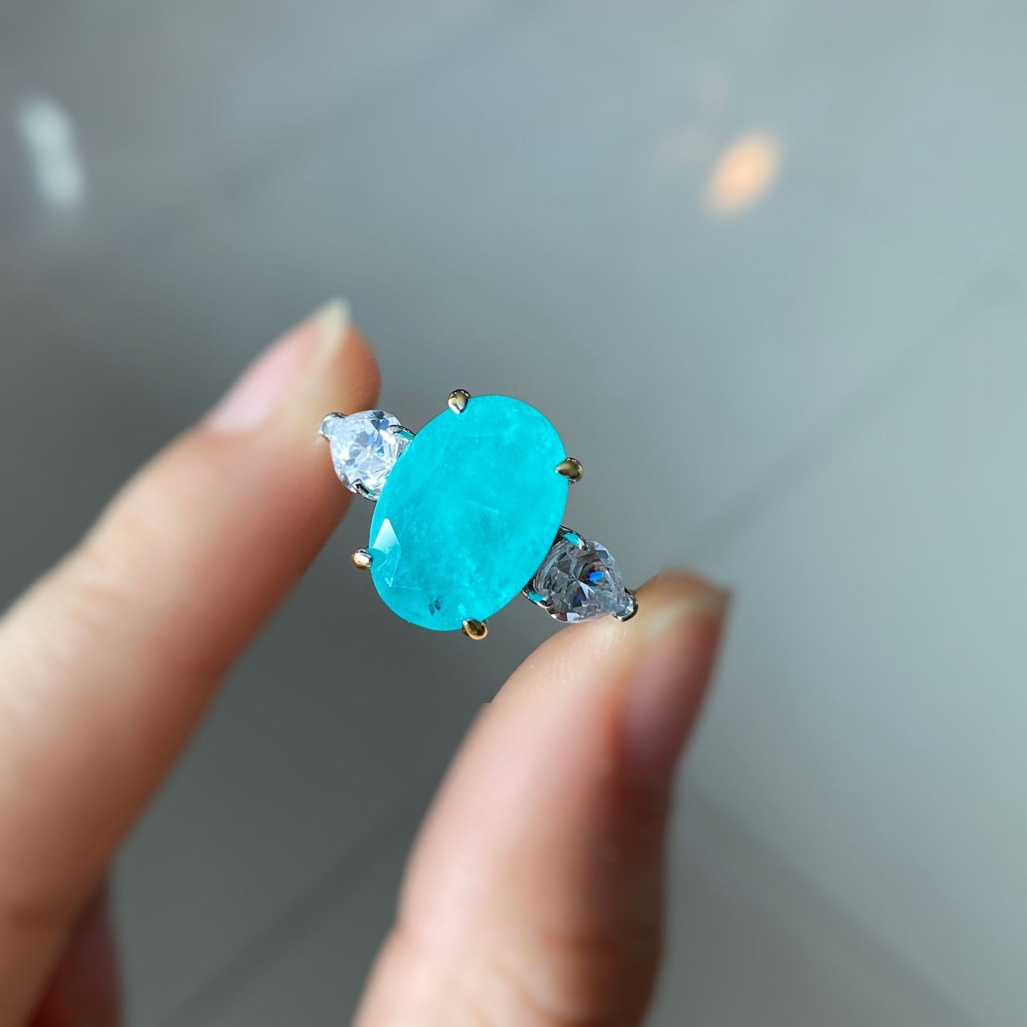 Large 925 Sterling Silver Oval Cut Blue Palaiba Two Tone Silver/Gold Ring Surrounded by Inlaid Gemstones..