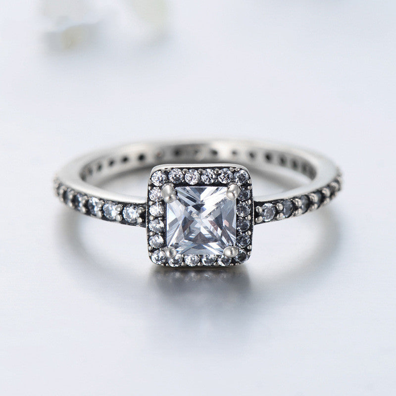 Retro 925 Sterling Silver Square Cut CZ Ring with Inlaid Adornments.