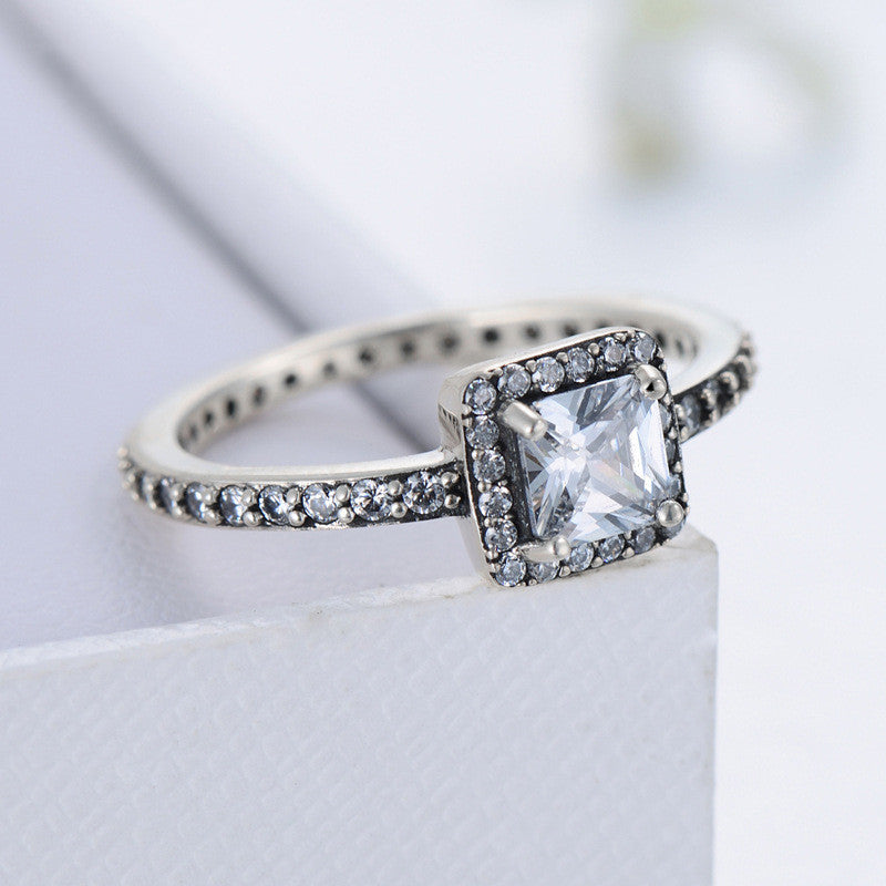 Retro 925 Sterling Silver Square Cut CZ Ring with Inlaid Adornments.