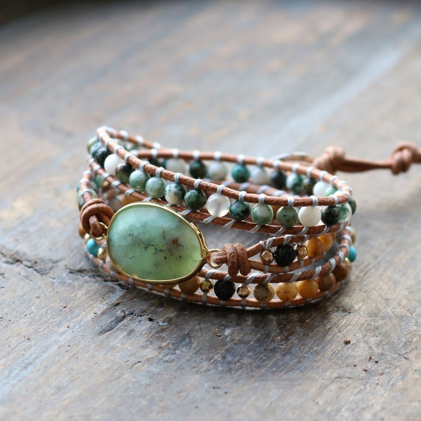 Three-Layer Handmade Natural Style Stone Beaded Bracelet with Adjustable Leather Cord.
