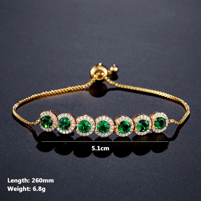 Emerald Round CZ Adjustable Bracelet Adorned with Sparkling Gems.