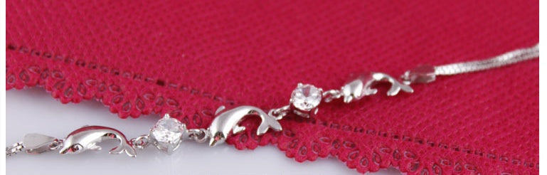 Playful Swimming Dolphins Amethyst 925 Sterling Silver Bracelet.