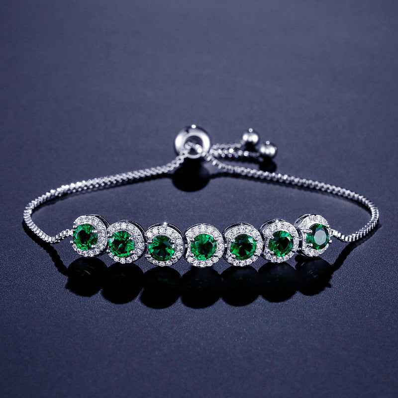 Emerald Round CZ Adjustable Bracelet Adorned with Sparkling Gems.