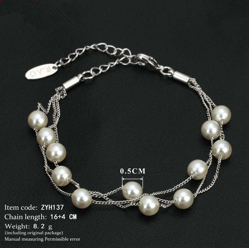 Unique Blend of Classic & Modern Three Layer Faux Pearl Bracelet.