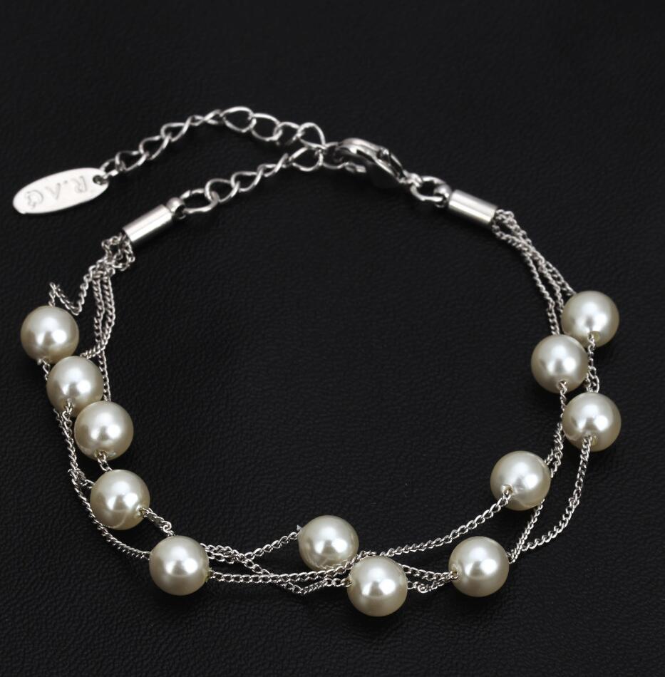 Unique Blend of Classic & Modern Three Layer Faux Pearl Bracelet.