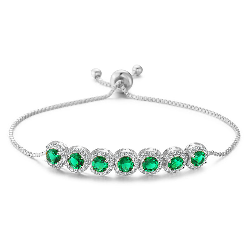 Emerald Round CZ Adjustable Bracelet Adorned with Sparkling Gems.
