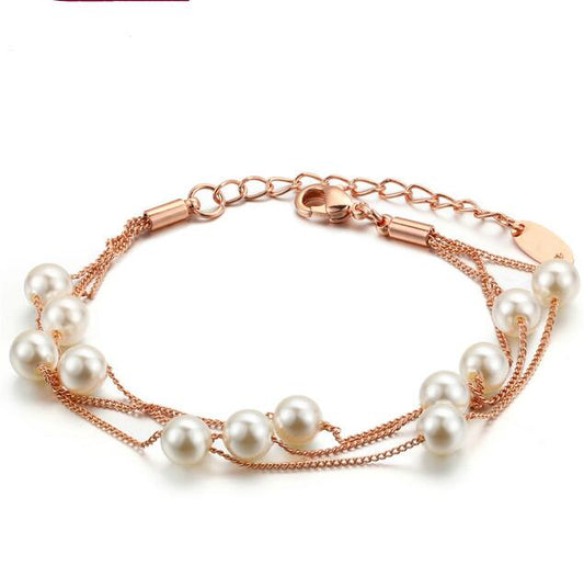 Unique Blend of Classic & Modern Three Layer Faux Pearl Bracelet.
