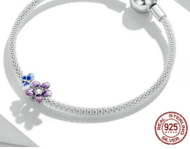 Sterling Silver Round mesh Bracelet with Colorful Flower Accent Beads.