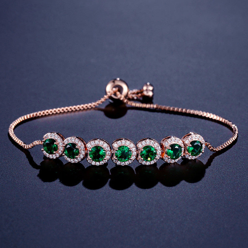 Emerald Round CZ Adjustable Bracelet Adorned with Sparkling Gems.