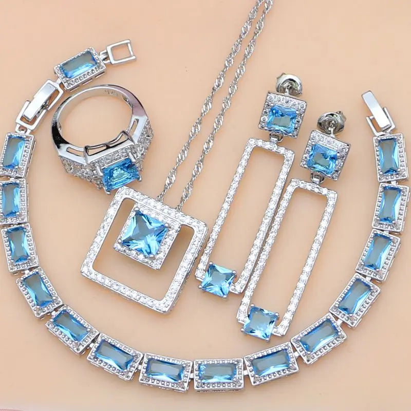 Royal Chic Blue Topaz 5 Pc. 925 Silver Jewelry Set - Necklace, Ring, Earrings, Bracelet.