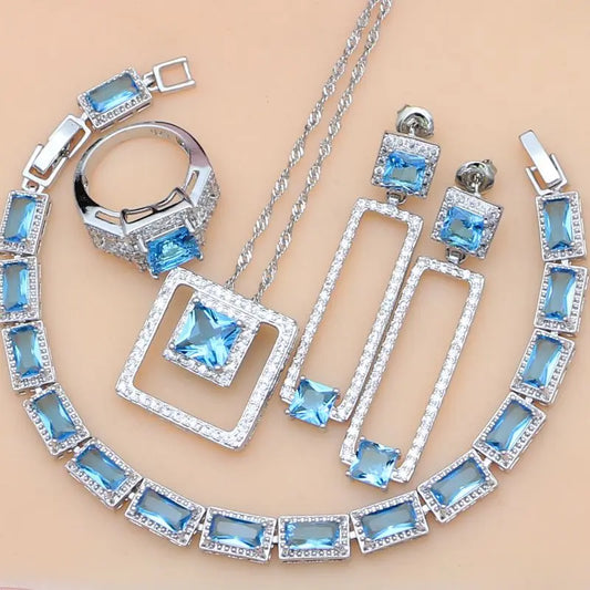 Royal Chic Blue Topaz 5 Pc. 925 Silver Jewelry Set - Necklace, Ring, Earrings, Bracelet.