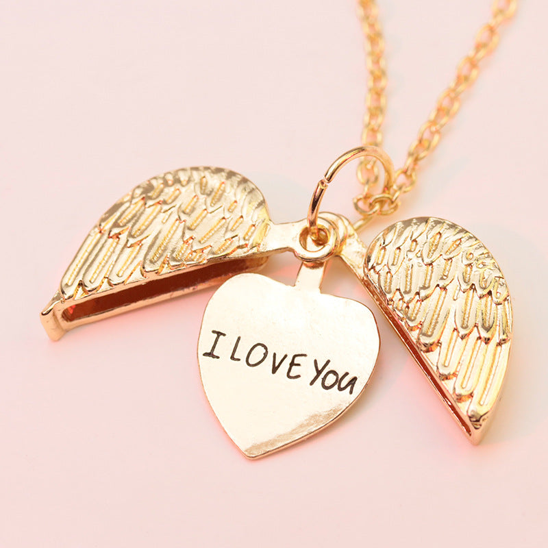 Open Your Heart Angel Wings Love Necklace in Silver or Gold.