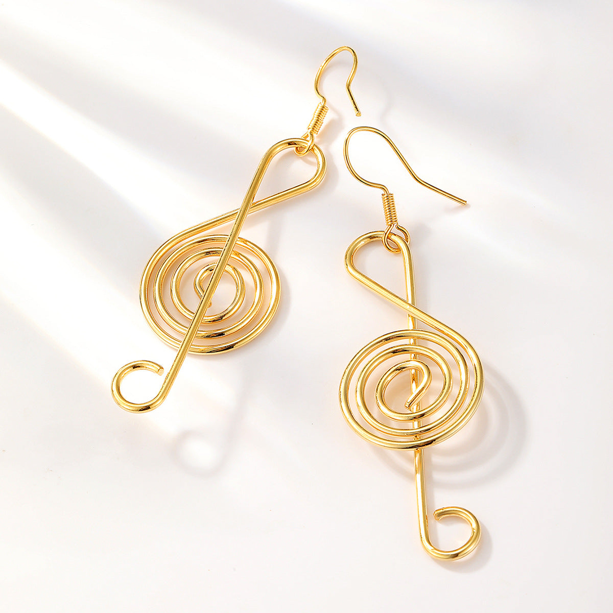 Playful Musical Clef Gold Dangle Drop Hook Earrings.