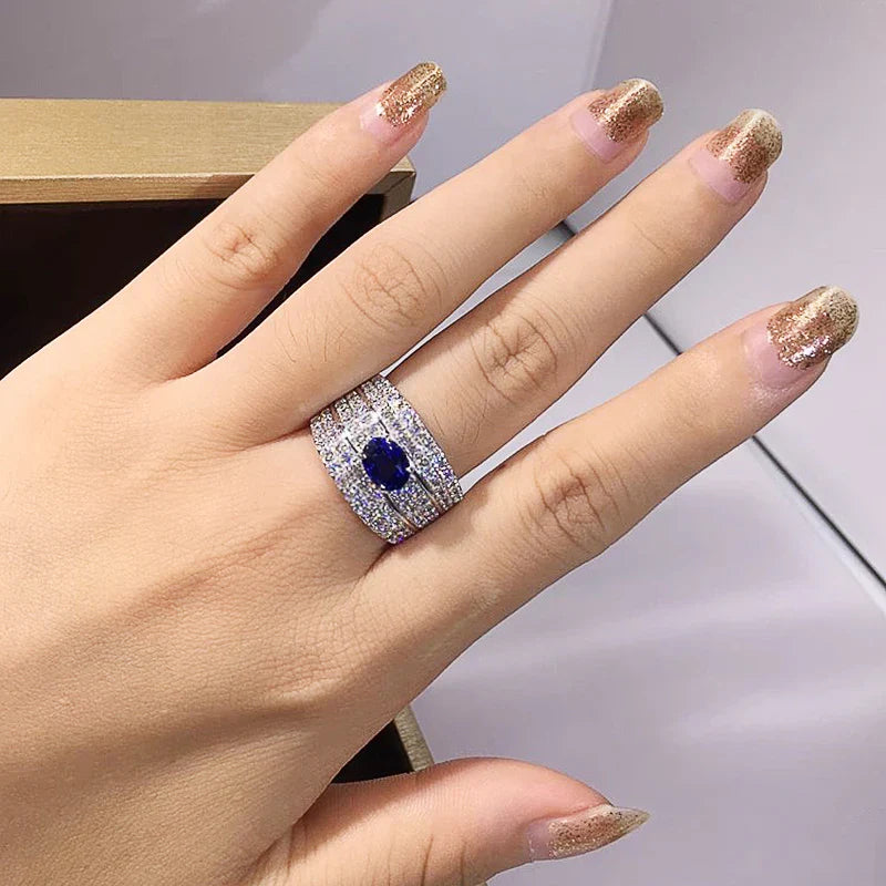 Sparkling Oval Blue CZ Wide Band Ring