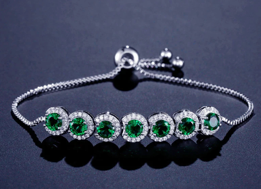 Emerald Round CZ Adjustable Bracelet Adorned with Sparkling Gems.