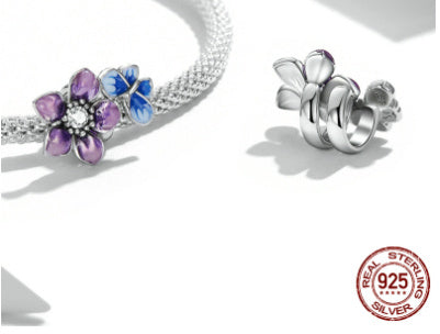 Sterling Silver Round mesh Bracelet with Colorful Flower Accent Beads.